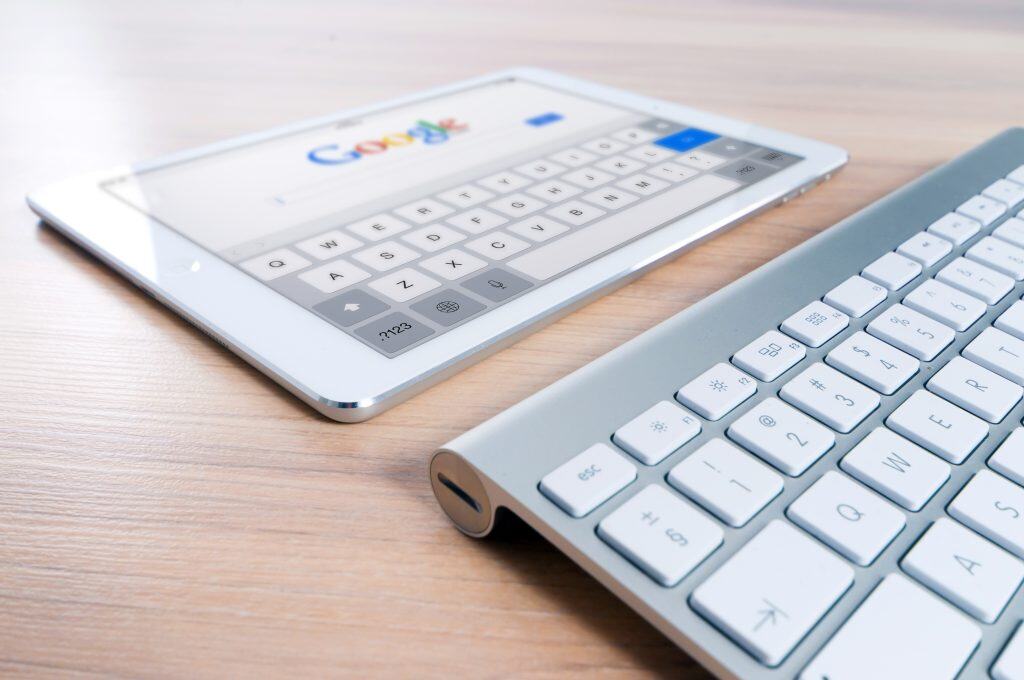 Google Data Studio displayed on tablet with keyboard for data visualisation.